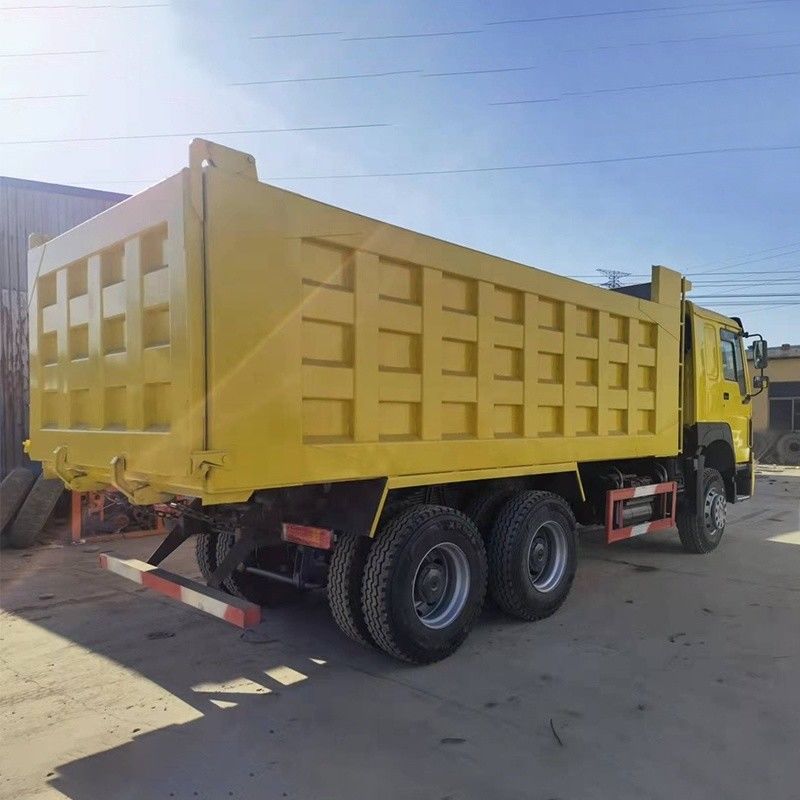 ABS 네 완전히 리모델링된 시노트럭 호우 371hp 8x4 24m3 틱퍼 덤프 트럭 타이어 12.00R20