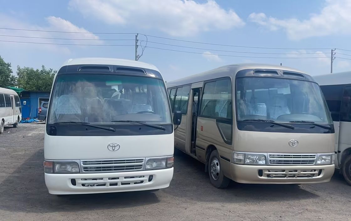 7m 30 좌석 토요 타 코스터 버스 엔진 용량 4L 전체 차원 mm 7725x2000x2600