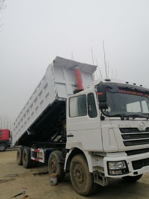 39000kg 구두 무게 샤크만 F3000 8x4 팅퍼 트럭 덤프 트럭 6.2-8m 화물 탱크 길이
